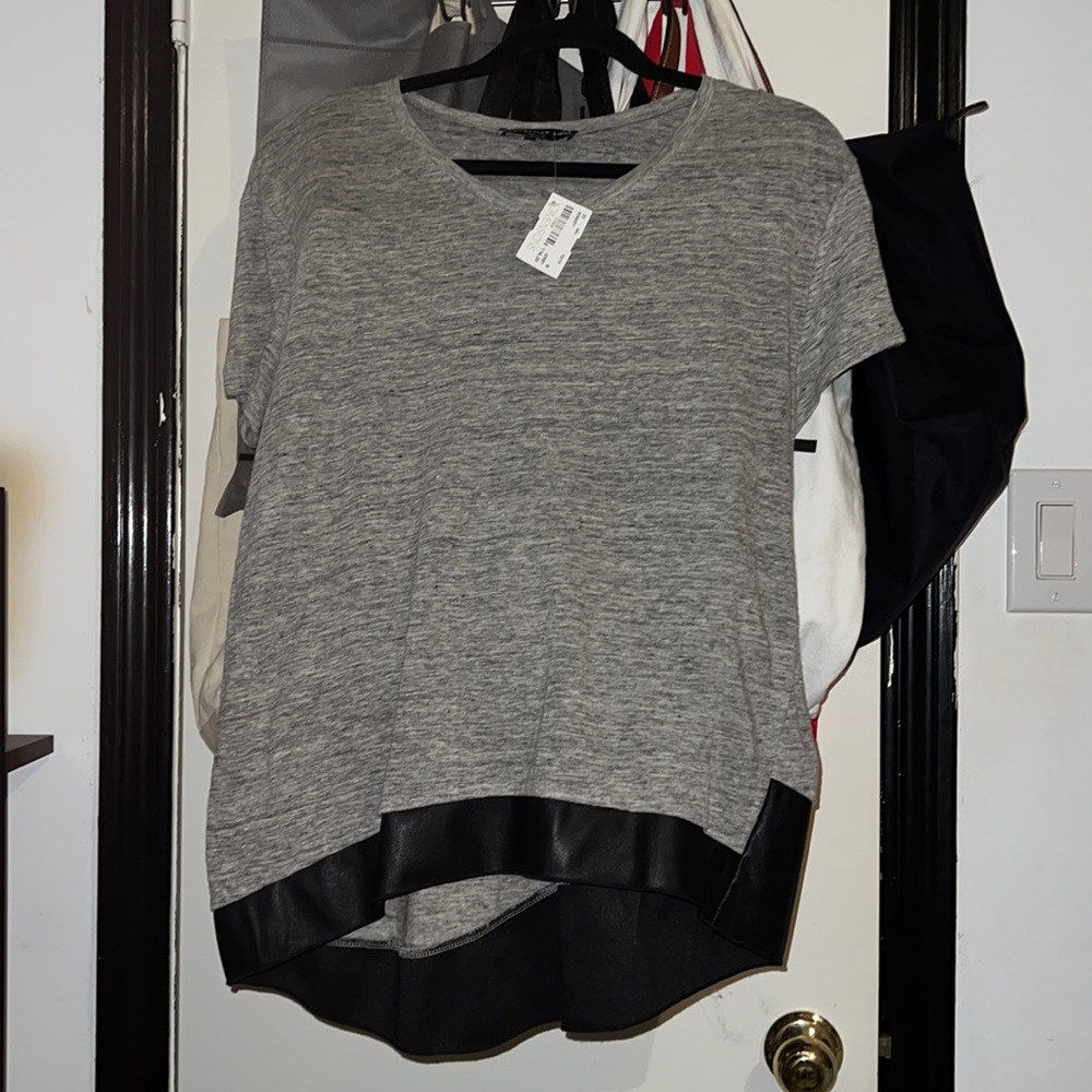 Grey shirt with black non leather trim